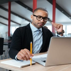 serious-businessman-using-laptop-in-the-office-1920x1080-2-350x350.jpg